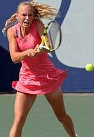 click for tennis news photos