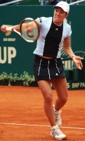 click for Warsaw tourney photo gallery Henin-Hardenne pics