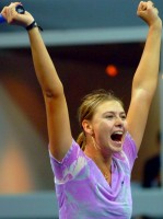 click for tourney gallery, where this nice pic is 768x1024 -- Maria has said, jokingly, that she is 6-2, but that she would prefer to be called 6-1 1/2